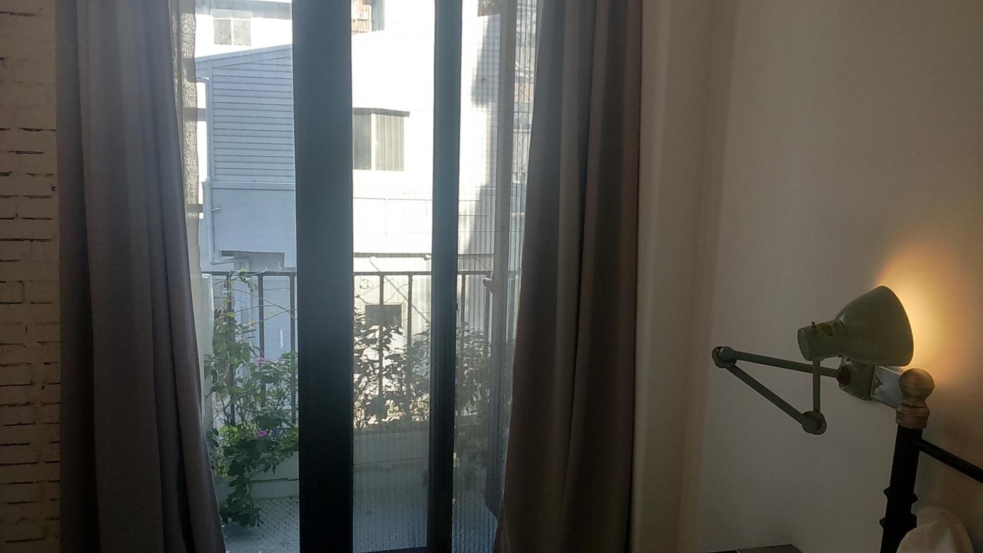 白狗公寓amo B&B市區金三角 東大門夜市 Hualien Rom bilde
